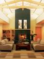 tv above fireplace photo.